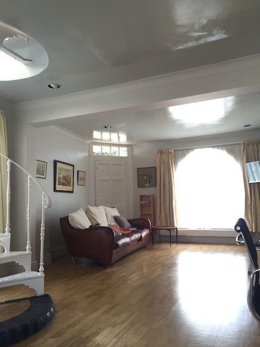 Beautiful and clean with lovely natural light streaming into the living room.