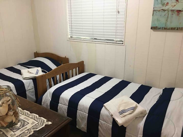 Two twin beds in second bedroom