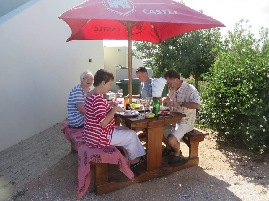 Guests enjoying breakfast at Nautilus braai facilities.