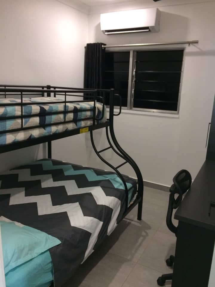 Bedroom 3 with a double bunk (single on top) with desk wardrobe and drawers. Black out louvres and black out curtains.
