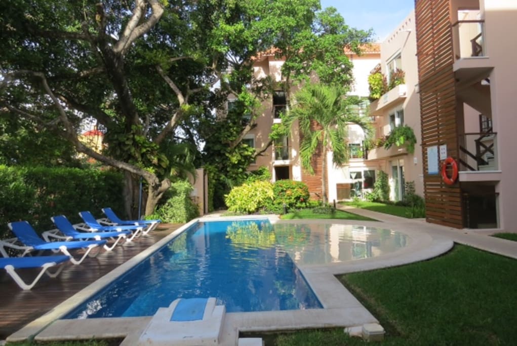 Walk to the beach or relax poolside.