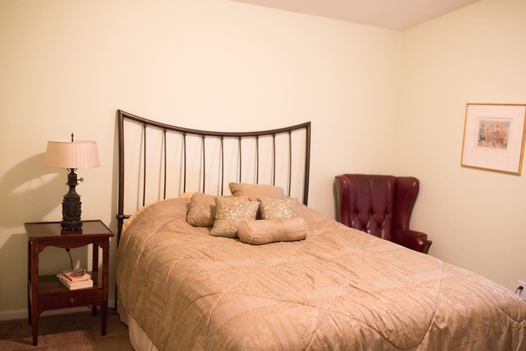 Guest room with queen bed.