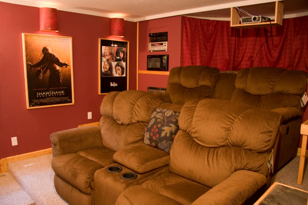 Plush seating for 4 plus berth for kids up top. Kids freak for the movie theater. Bad weather insurance too!