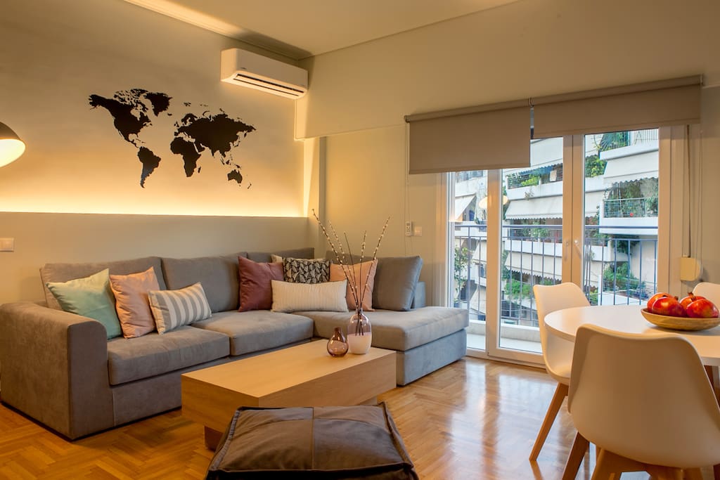 Open living room, dining room and kitchen with direct access to terrace