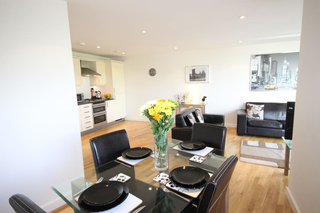 Dining area with fully equipped kitchen for home cooking and washing facilities