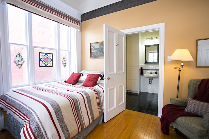 Room 2 - The room has great natural lighting as well as ceiling and side lamps.