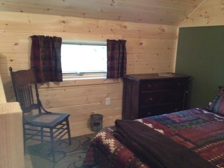 sleep loft looks out to the water
