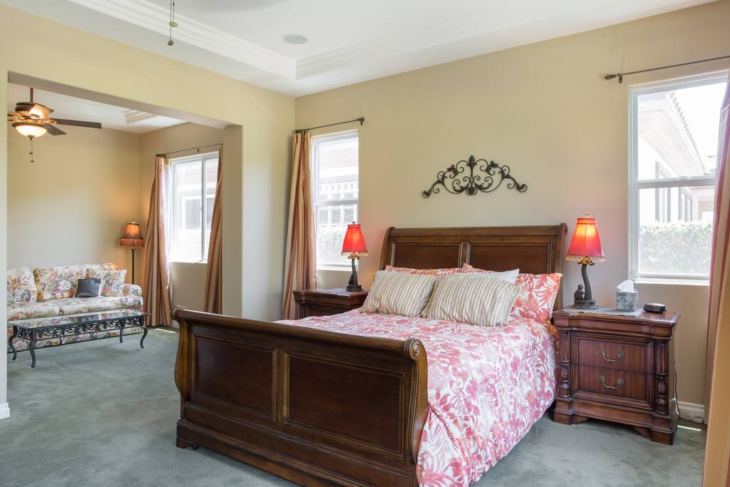 Master bedroom, kingsize bed, also has a retreat with a sofa and treadmill