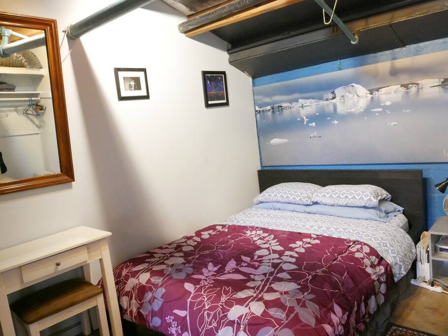 Bed and vanity in Suite bedroom.