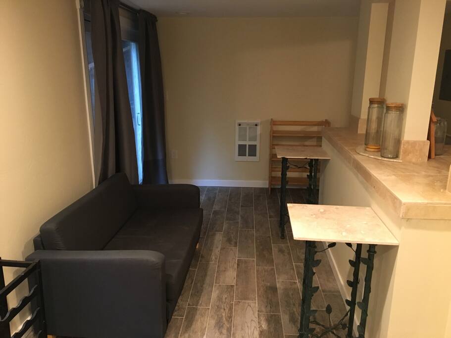 Downstairs living area, will have a TV soon.