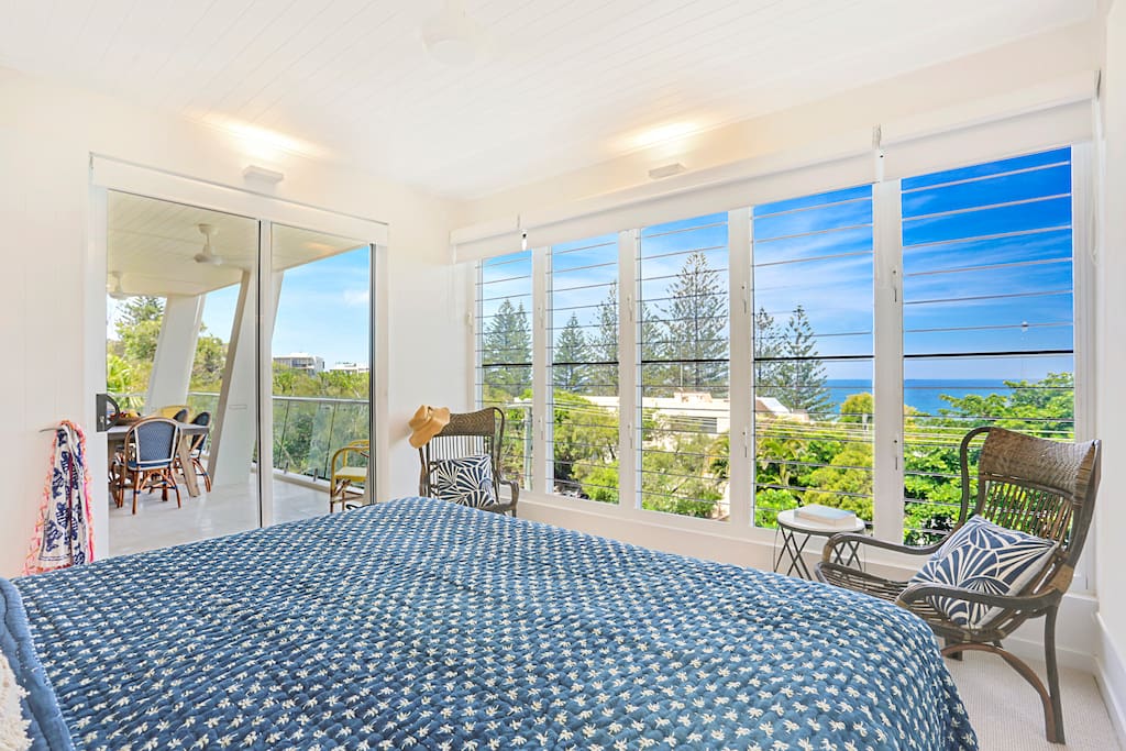 view from master bedroom overlooking ocean and out to terrace