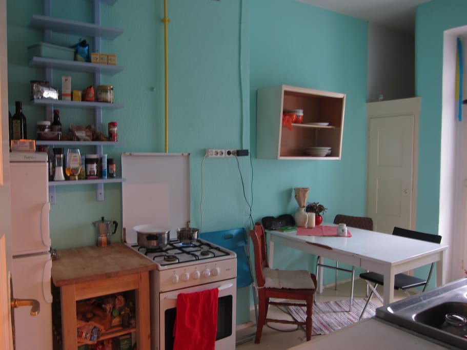 small but chique, our kitchen also features a small balcony that gets direct sunlight for most of the day