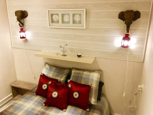 A4 Studio INDEPENDENT COMMODE near the shrine