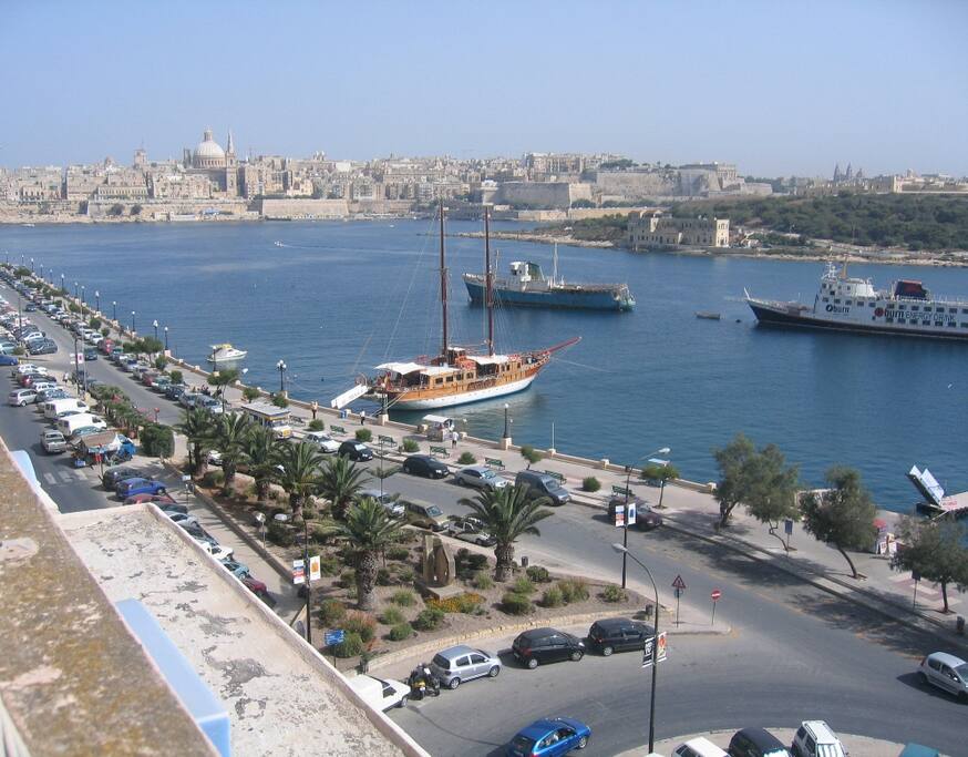 Gold - front view from apartment roof with view of Valletta in background