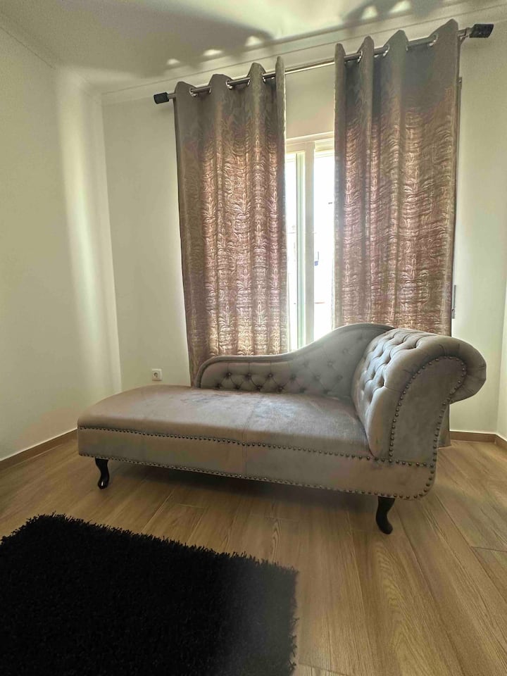 Chaise-longue-style sofa.