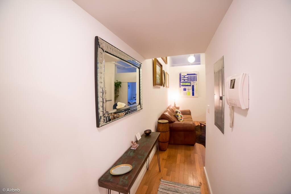 Entryway, bathroom to the right.