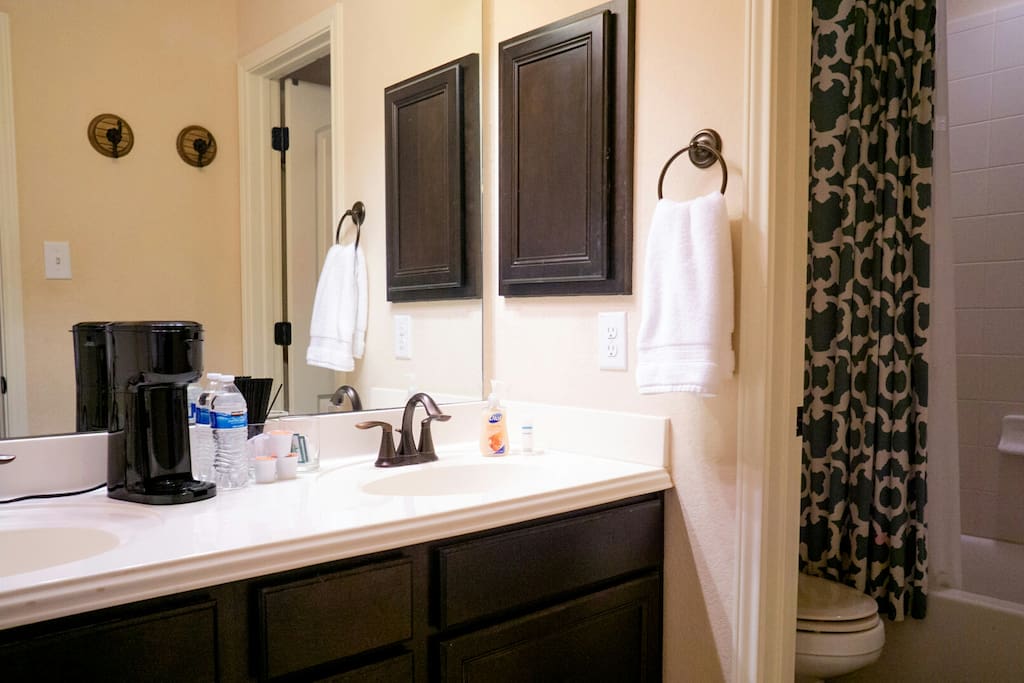 Dual sink vanity. Coffee bar with Organic coffee pods.