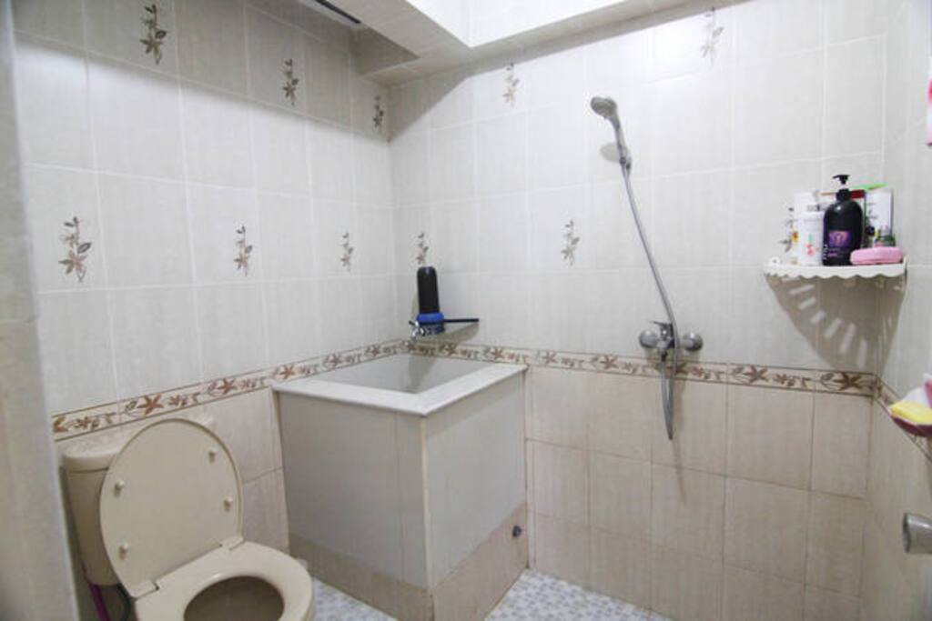 Bathroom with shower , shampoo, and soap