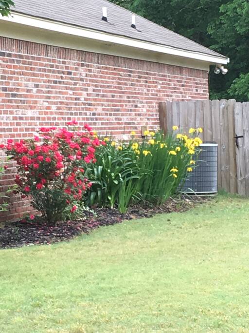 In the spring and summer, flowers and blooming trees add to the peaceful environment of this wonderful home.