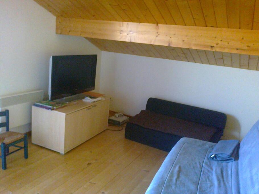 chambre clic-clac, chauffeuse , télé