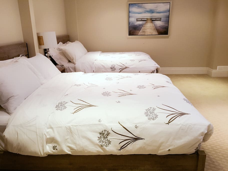 Bedroom 1 with two queen beds.
