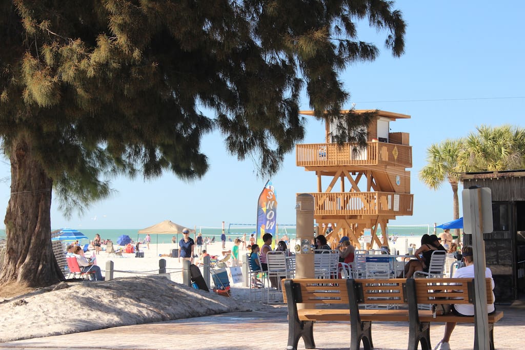 Bradenton Beach with lifeguards on duty, bathrooms, shower, restaurant, volleyball and playground.