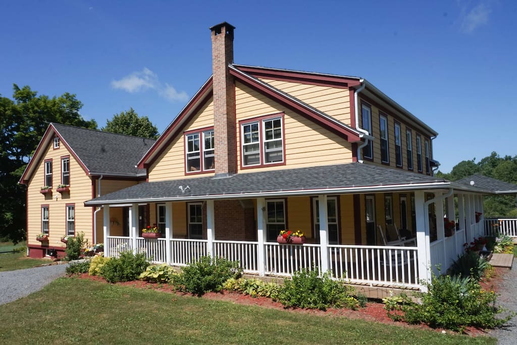 Farmhouse is wrapped with deck and gardens for you to enjoy