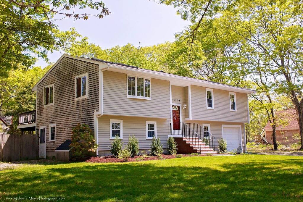 The large property is beautifully landscaped and has plenty of parking for all guest, including a garage.