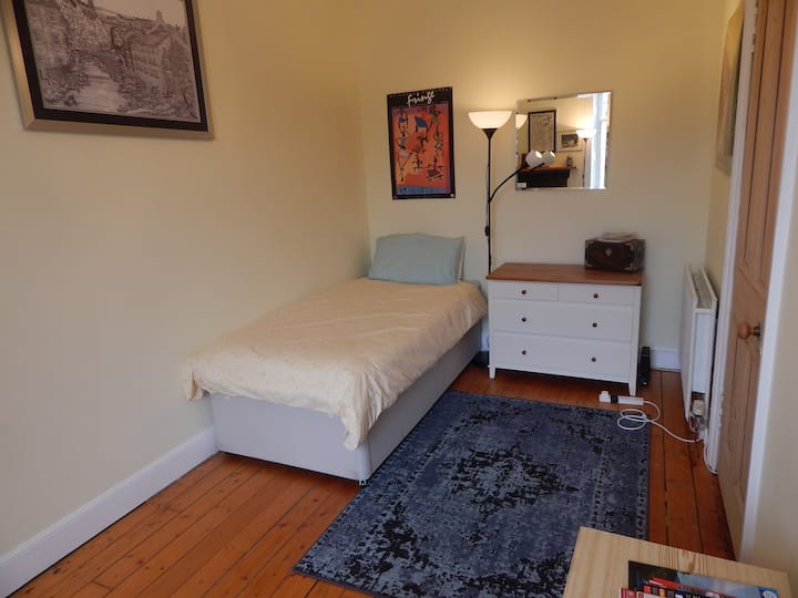 Comfy room. Great reviews. Best city in the world!