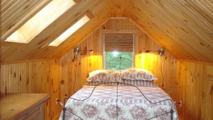 Loft bedroom with ventable skylights