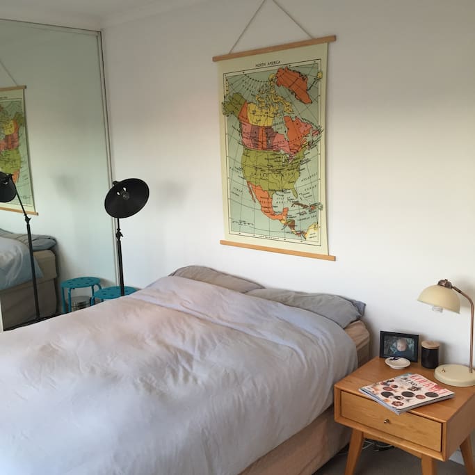 Modern, comfortable master bedroom with Queen size bed, full length built in cupboards for guest use.