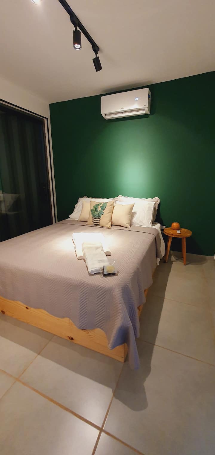 Our cactus room. Delicious queen bed with 300 thread count sheets and 100%  cotton to relax.