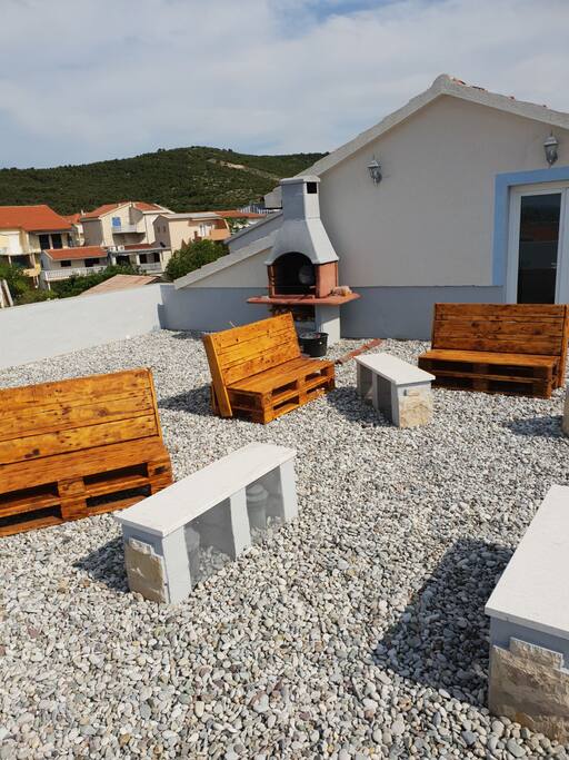 Rooftop Patio with BBQ and sitting area with the beautiful ocean view and nearby islands