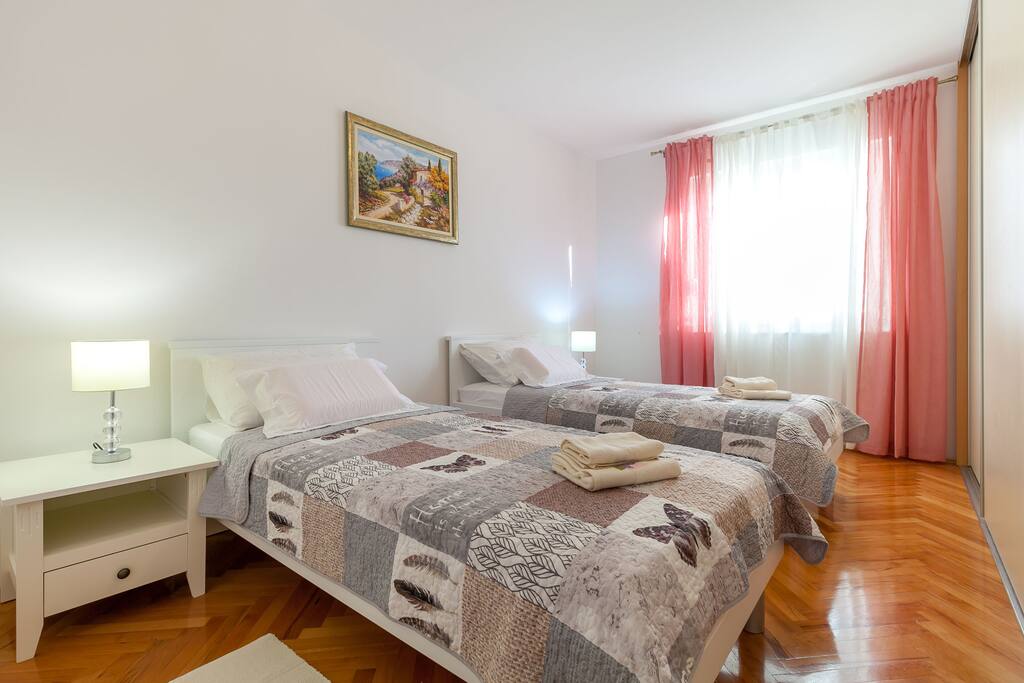 Room 1 with two separate beds