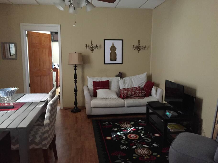 Enjoy a quiet evening on our couch and chat over a glass of wine.