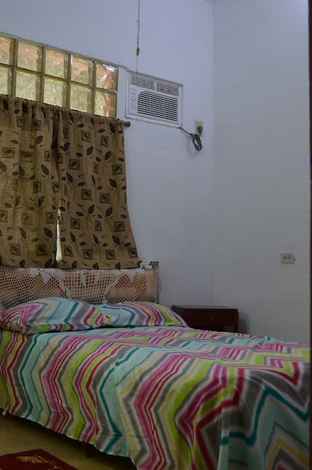 Small but nice and confortable bedroom.