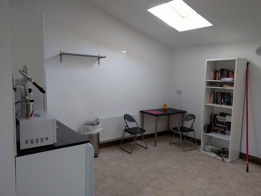 Kitchen with fridge/freezer and clothes washer