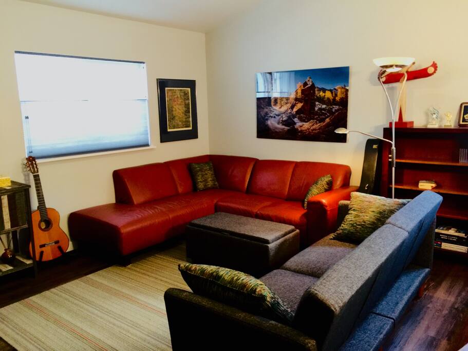 Spacious living room for groups with full sized sofa sleeper.