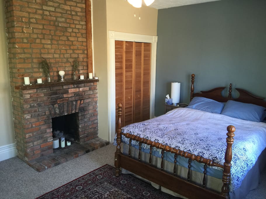 Bedroom 1: Relax and enjoy the sunny, west-facing bedroom with queen bed and fireplace.