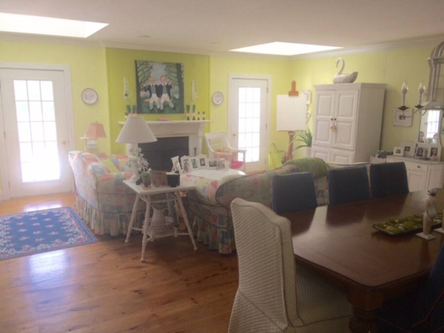 Great room with dining area & doors to deck