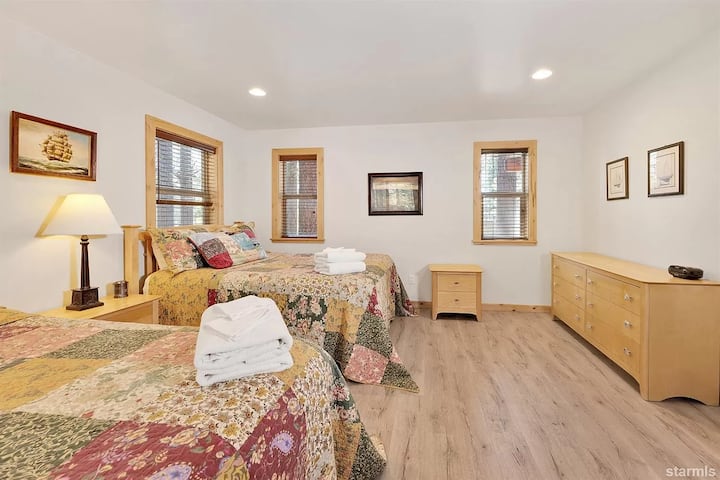 Downstairs bedroom with dual Queen-sized beds