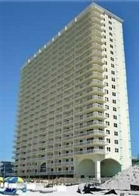 First floor means first to the beach and no elevator required!