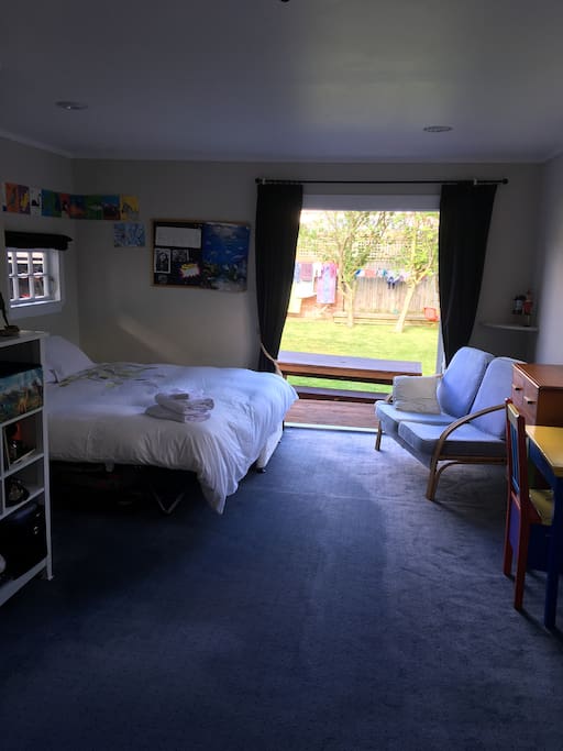 Bedroom 2- large room with one queen or 2 single beds, plus ensuite toilet & sink- opens onto garden