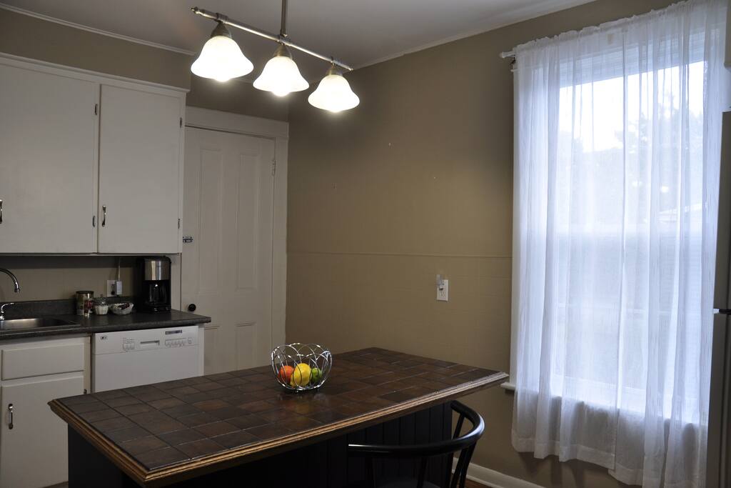 Kitchen with island and dishwasher