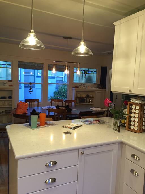 Very large dining room adjoins the kitchen; large table seats 8-10 or more if needed.
