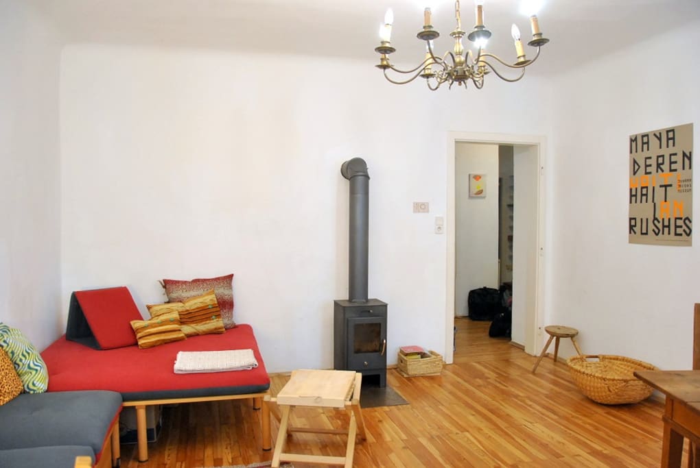 living/studying room 1: view on couch and wood-fire oven