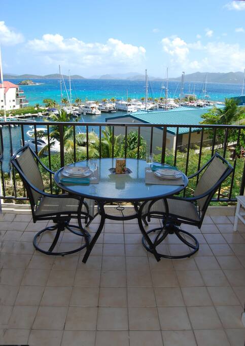 Scenic outdoor dining for 2 or 4 with soft sea breezes and an incredible view.