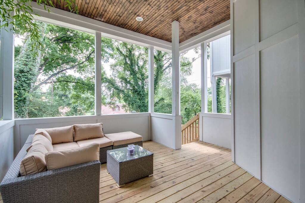The covered back deck makes for an excellent spot to spend the afternoon--rain or shine.