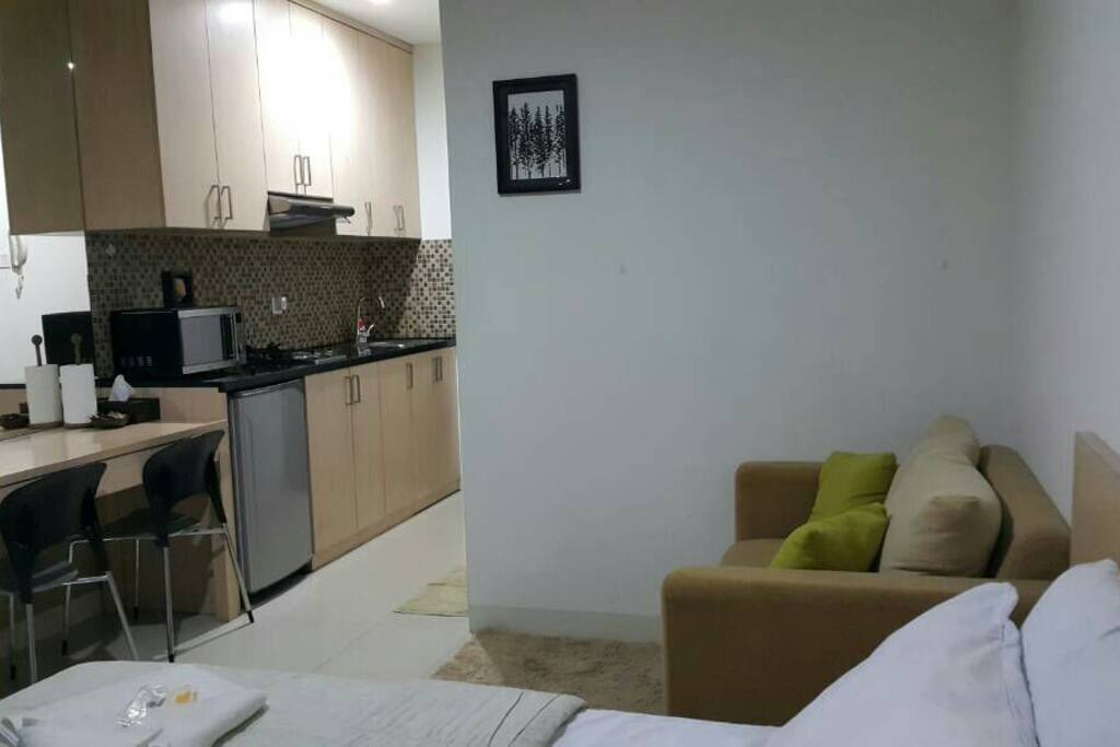 Complete with sofa, working desk and kitchen