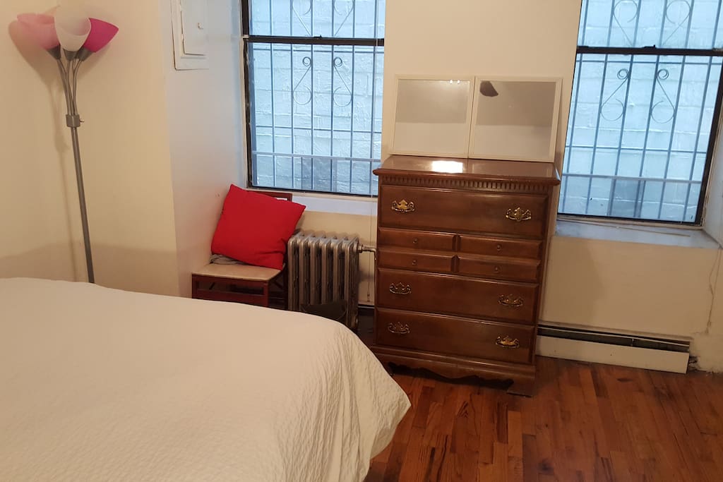The bedroom and windows. There is no apartment on the other side so lots of privacy